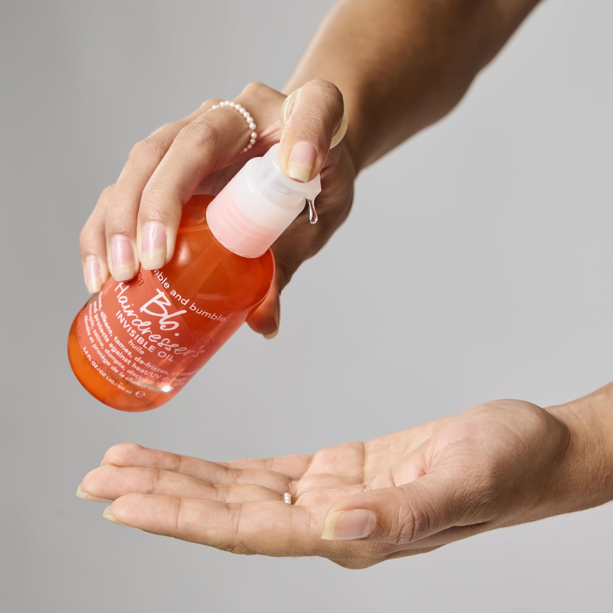 Bumble and bumble. Hairdresser's Invisible Oil Frizz-Reducing Hair Oil | Heat Protection, Frizz Control + Shine | Curly, Wavy, Straight | With Grapeseed, Coconut + Argan Oils
